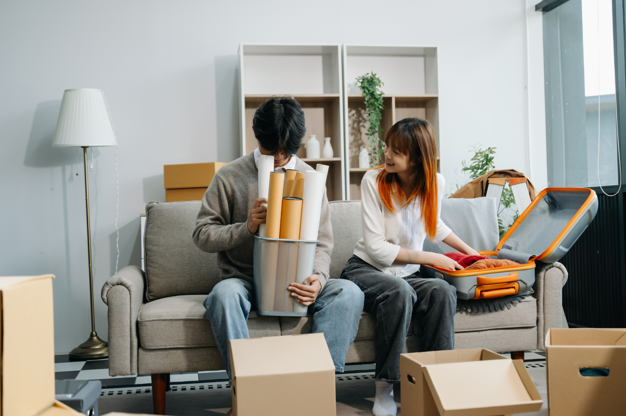 Frisco family planning a move to a larger home while reviewing a school calendar and neighborhood map